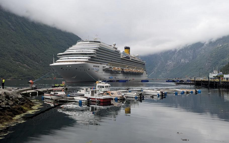 Costa Diadema cruise shop sitting on the water on a foggy day